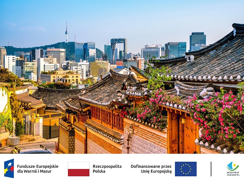 Widok koreańskiego miasta wraz z logotypami 