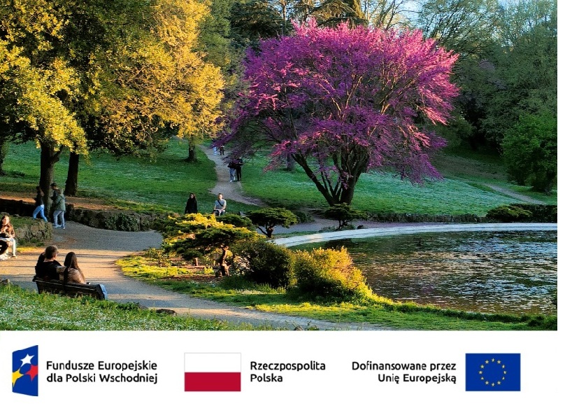 Zdjęcie alei i drzew w parku wraz z logotypami 